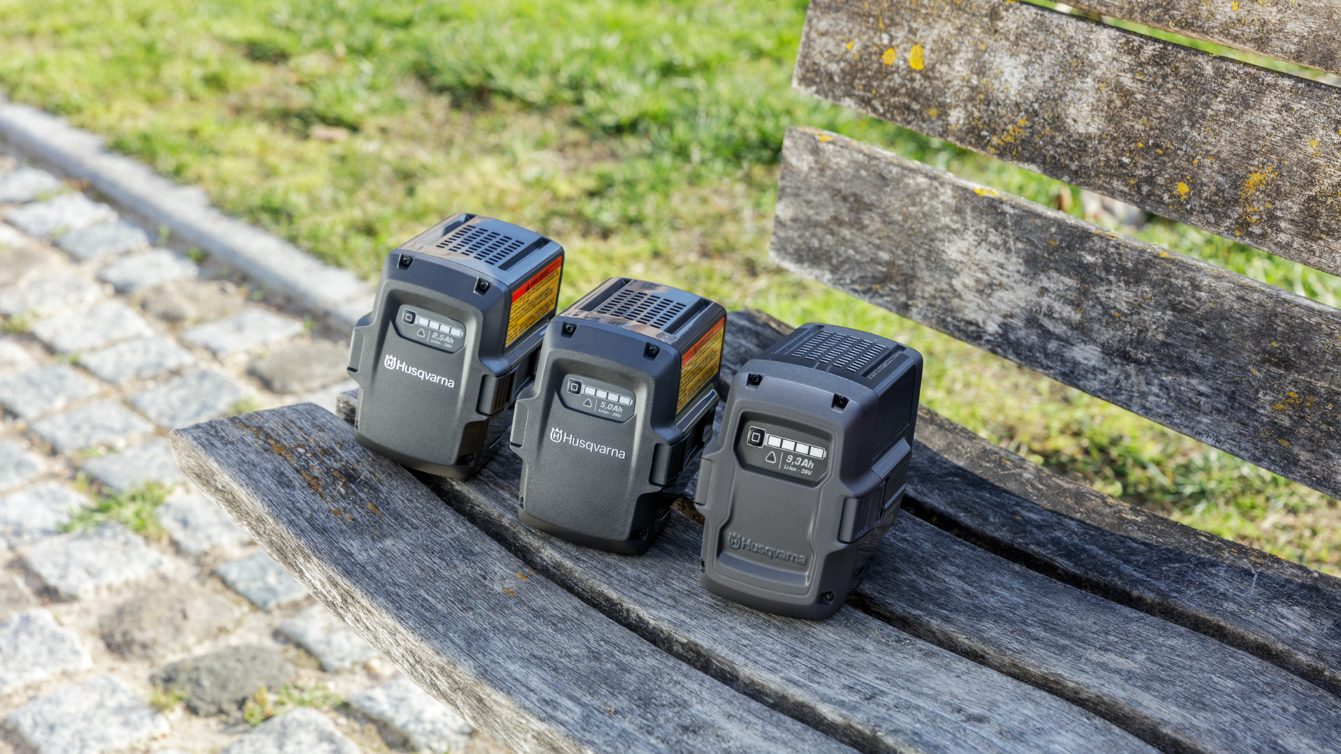 batteries sitting on wooden bench